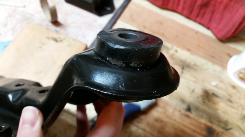 Cast on top of the outer shell so that it can’t flop around; it also passes completely through the remains of the rubber bushing. The inner sleeve was squared up to the outer shell before pouring the urethane.